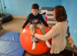 The physical therapy gym is designed to help children build strength, balance, coordination, and endurance.